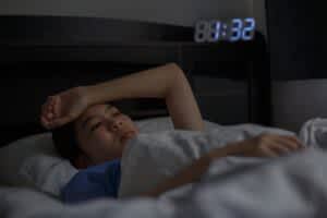 stock photo of a woman who can't sleep