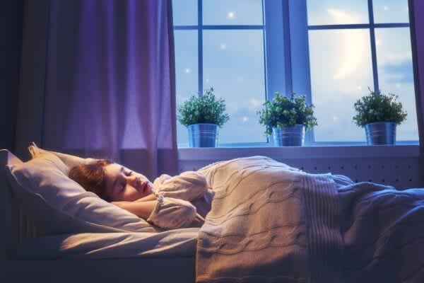 stock photo of a young girl sleeping