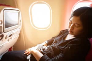 Woman sleeping on a plane