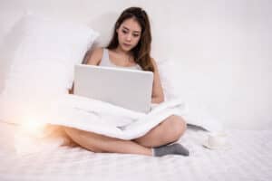 Woman doing research on Sleep Aids