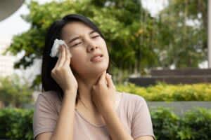 stock photo of a woman sweating from humidity